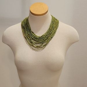 Beaded Green necklace with wooden clasp